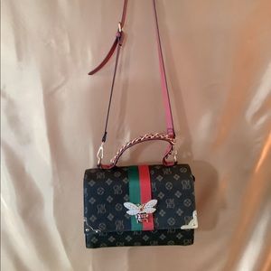 Chrarisma brown and red purse with jewel encrusted bee charm
